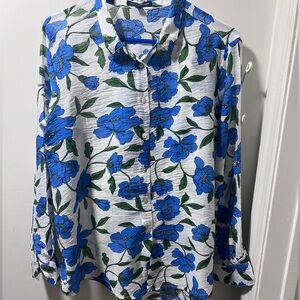 Vibrant white and blue floral blouse.